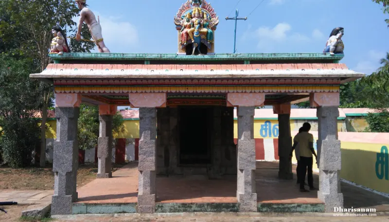 Open pillared shrine with a painted sculpture of deities on its roof