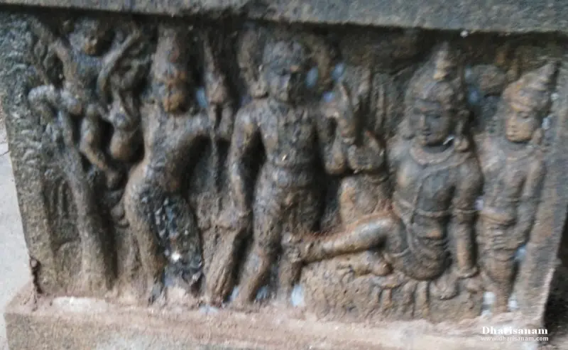 Carved panel with several standing and seated figures in a row, some wearing crowns