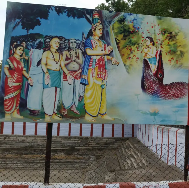A painting or relief in the temple, placed beside the story of the boy and the crocodile.