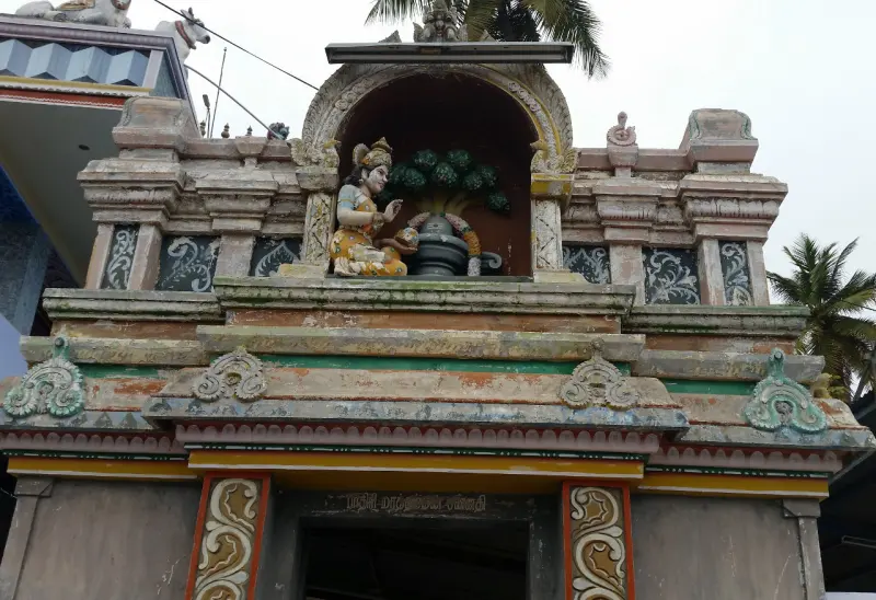 A second view within the temple, placed beside the legend of the Pathiri tree.