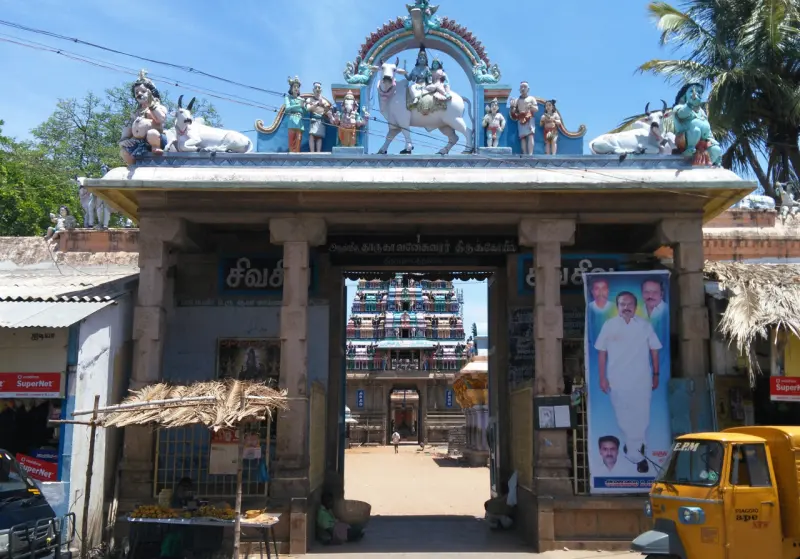 The temple's street entrance arch with painted figures