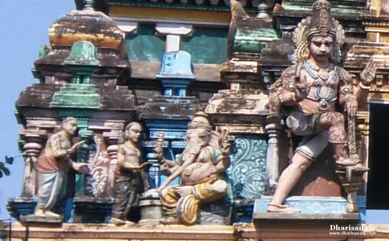 Tower sculptures of Vinayakar with devotees and a guardian