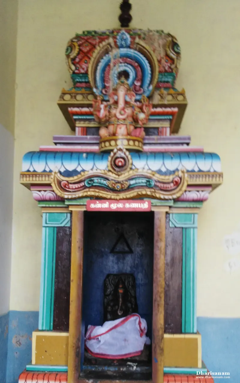Painted shrine topped by a Vinayakar figure, with a small idol inside