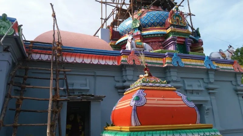 Colourful tower with Nandi bulls and bamboo scaffolding