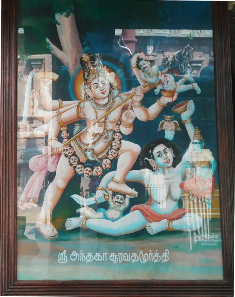 A framed colour painting of a multi-armed Shiva piercing a demon with a trident, with a Tamil title below