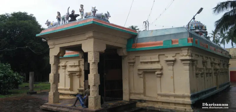 Pillared entrance hall with small animal and figure sculptures along its roof