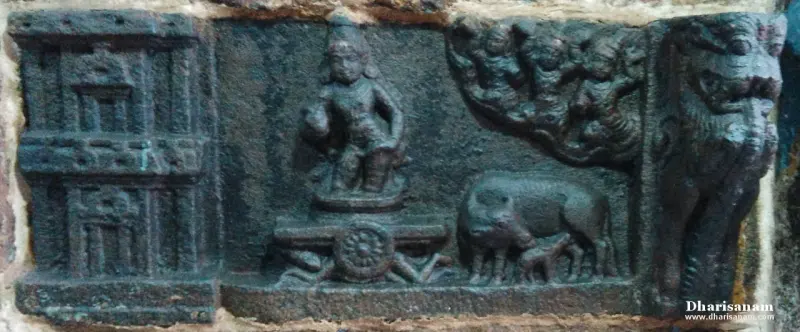 A stone relief with a figure on a chariot, a cow with her calf, and small carved figures