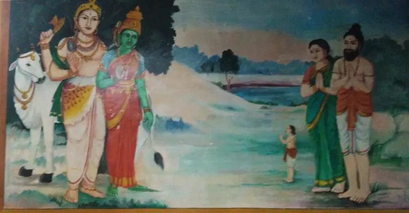 Painting: a goddess and a god beside a cow, with a boy and a praying couple before them