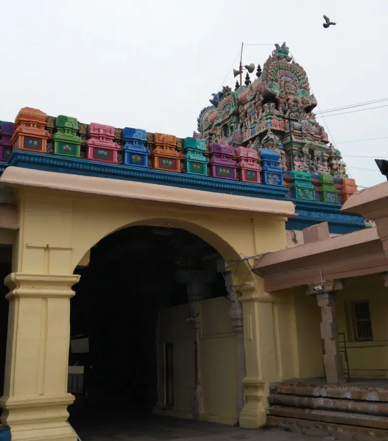 Archway topped with colourful miniature towers