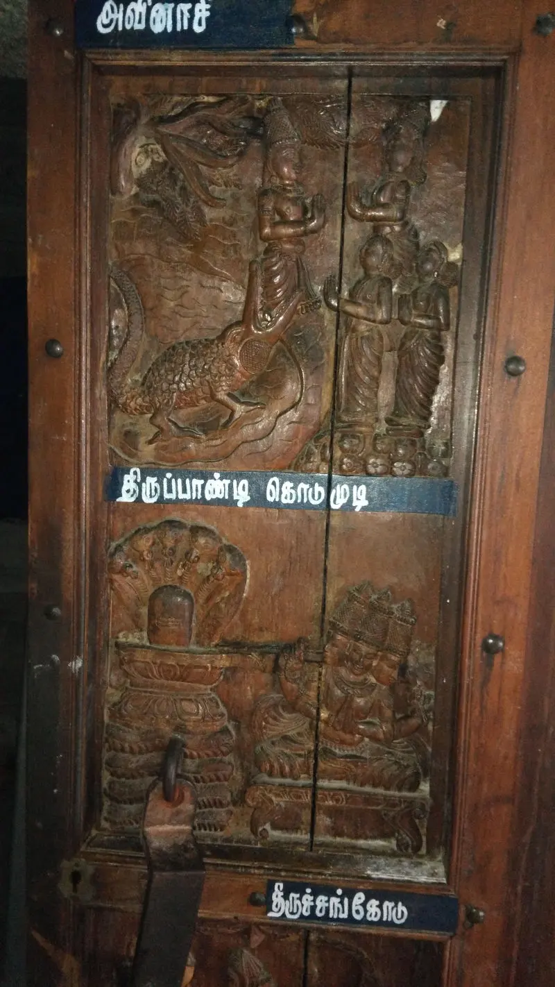 A closer view of the carved doors of the sanctum sanctorum